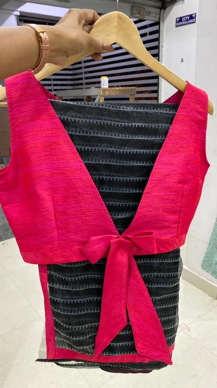 Pink silk bow patterned blouse